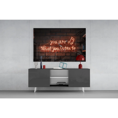 Neon music quote glass wall art on brick canvas with you are what you listen to sign