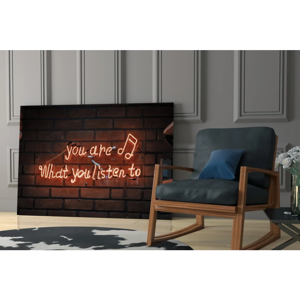Neon music quote glass wall art on brick with you are what you listen to