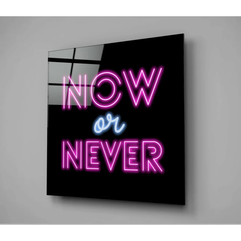 Pink and blue Neon Now or Never glass wall art on black background
