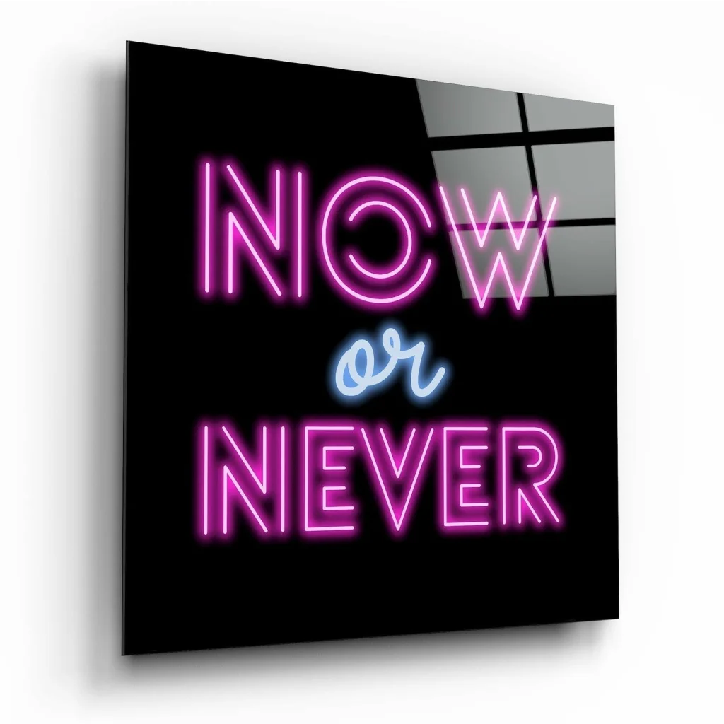 Pink and blue Neon Now or Never glass wall art on black background