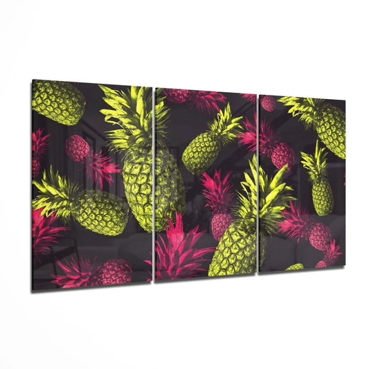 Neon pineapple triptych wall art set with vibrant yellow and magenta floats on dark background
