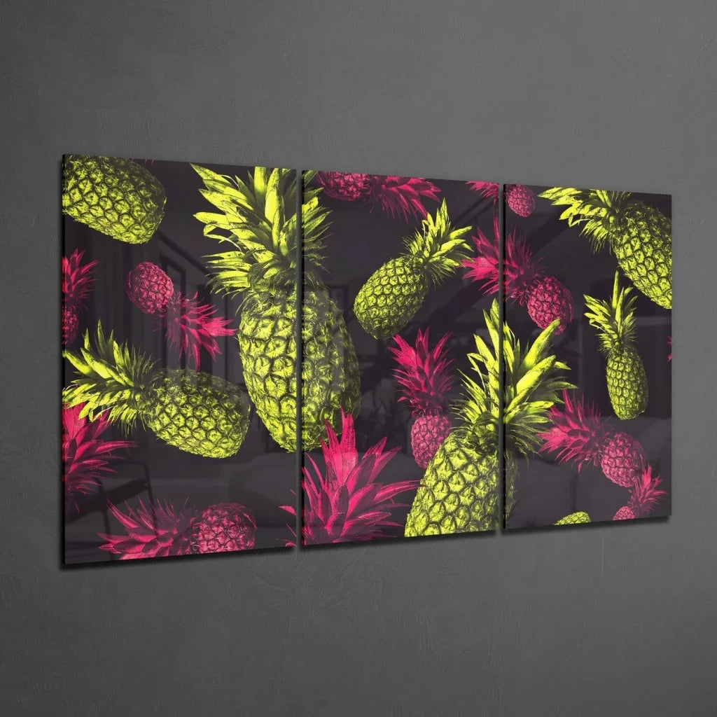 Vibrant neon yellow magenta pineapples float on dark triptych wall art canvas