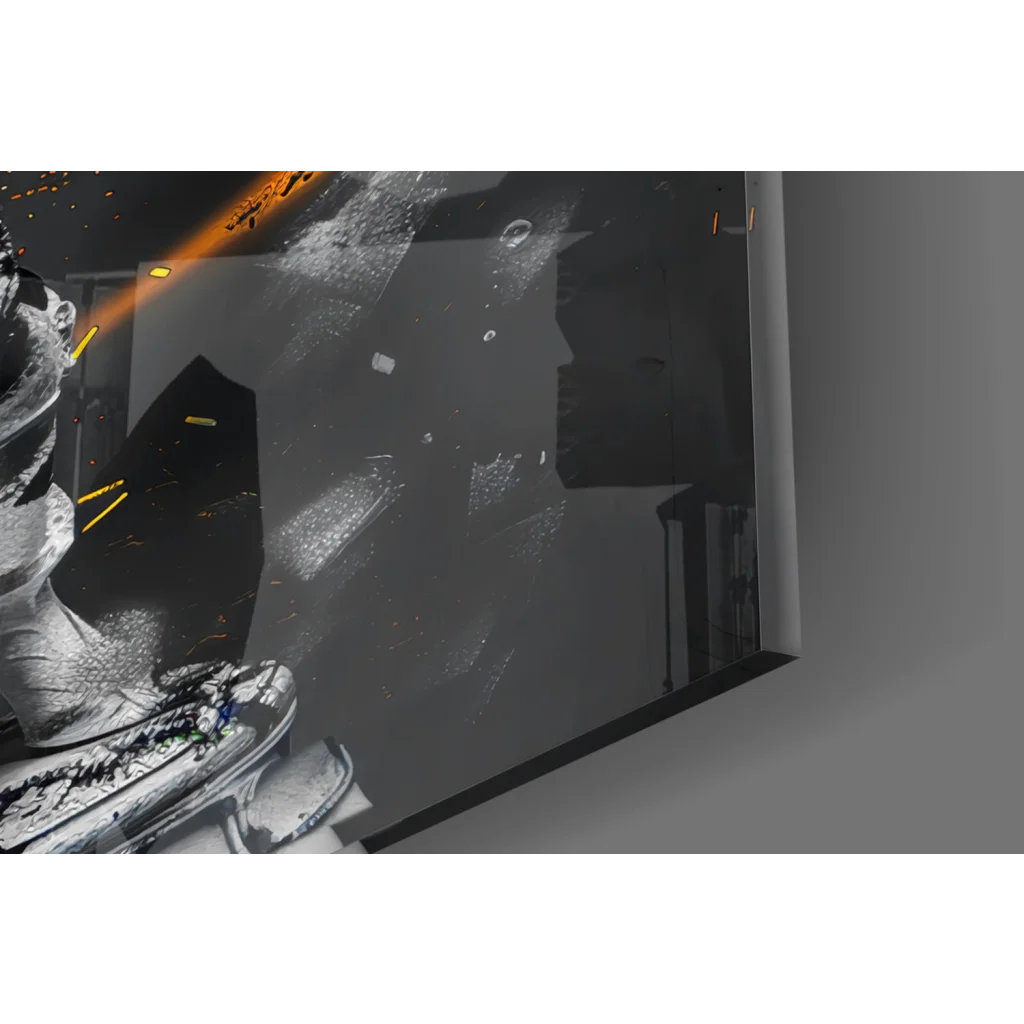 Stunning black and silver glass wall art with glowing orange streaks