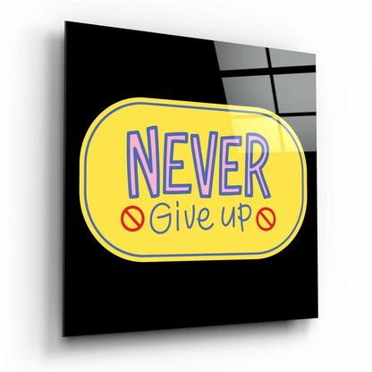 Never Give Up motivational glass wall art with yellow oval sign