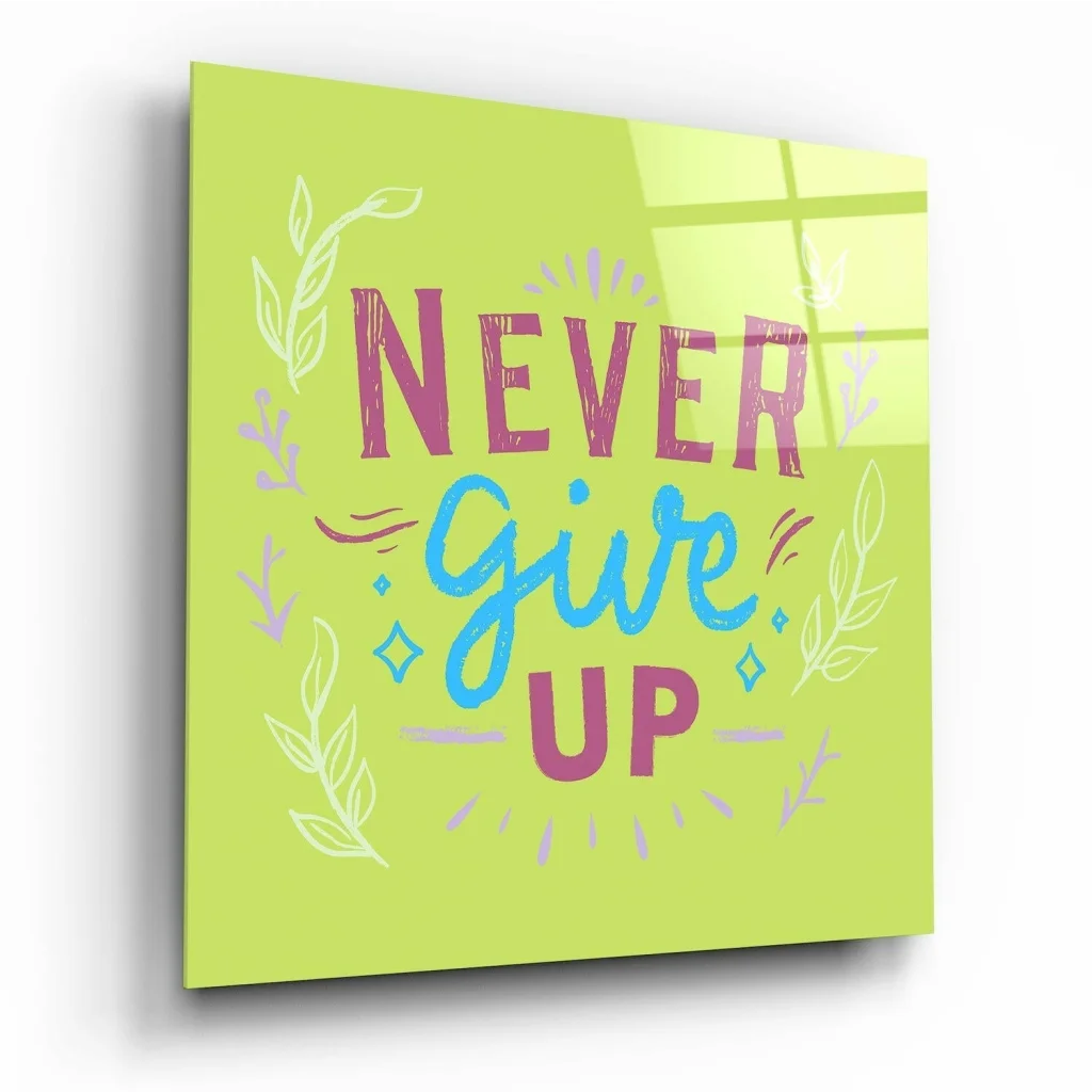 Lime green glass wall art with Never Give Up in pink blue lettering