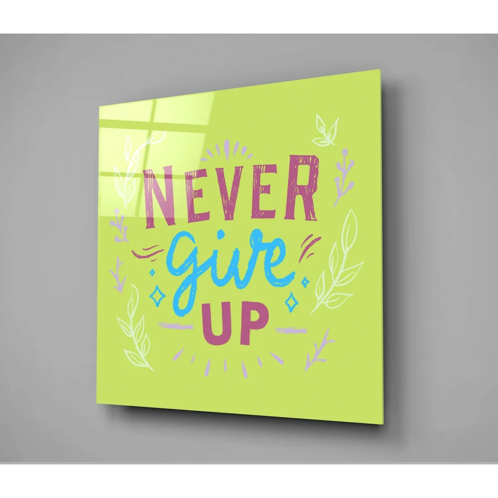 Vibrant lime green glass wall art with Never Give Up in pink teal lettering