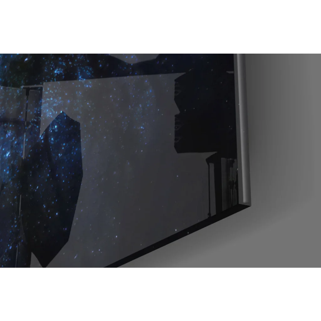 Sleek silver-framed glass wall art of starry sky with cosmic blue starfields