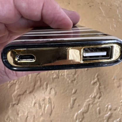 Kate Spade New York backup battery bank with gold-trimmed black case