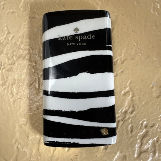 Kate Spade New York backup battery bank with zebra-striped case