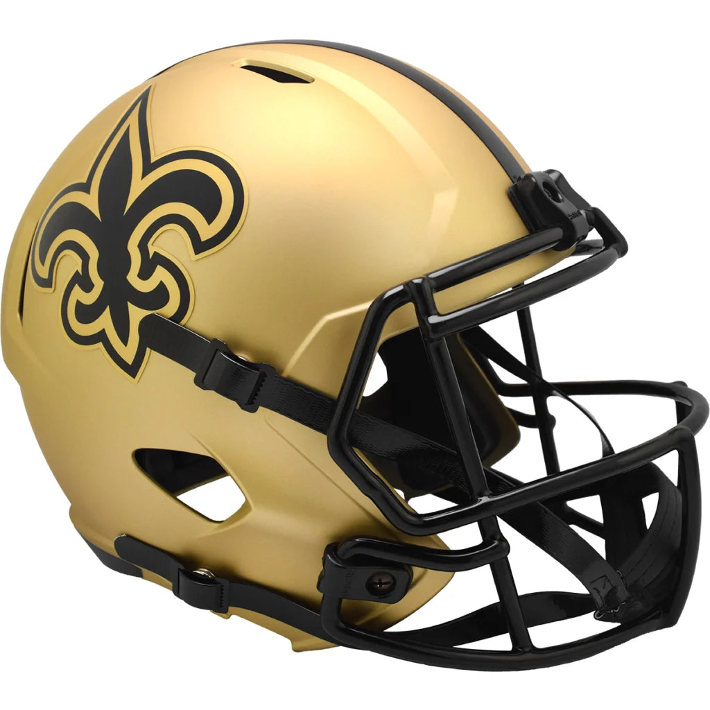 Gold New Orleans Saints replica football helmet with black face mask