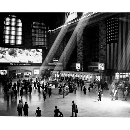 A large american flag hanging from the ceiling of a grand hudson river railroad train station for a river railroad gold bond certificate