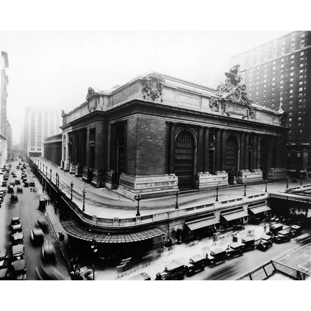 Grand central terminal beaux-arts stone facade with grand arches on hudson river railroad gold bond certificate background