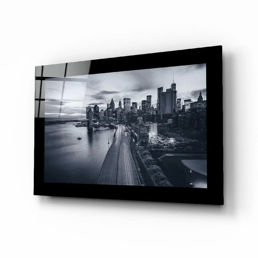 Black-framed black-and-white cityscape glass wall art print