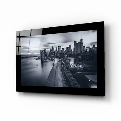 Black-framed black-and-white cityscape glass wall art print