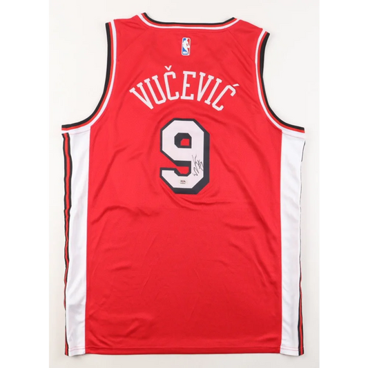 Nikola Vucevic signed Chicago Bulls jersey with autograph and number 9 on red back