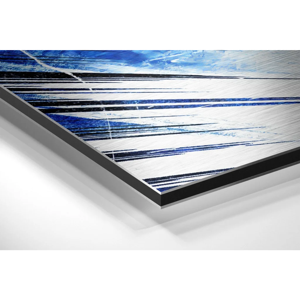 Abstract blue white canvas art with bold diagonal strokes on brushed aluminium dibond, framed black