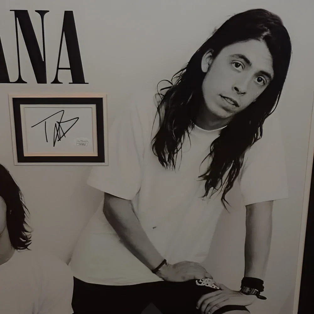Framed Nirvana music poster with Dave Grohl and Krist Novoselic autographs