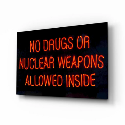 Orange neon no drugs or nuclear weapons glass wall art sign