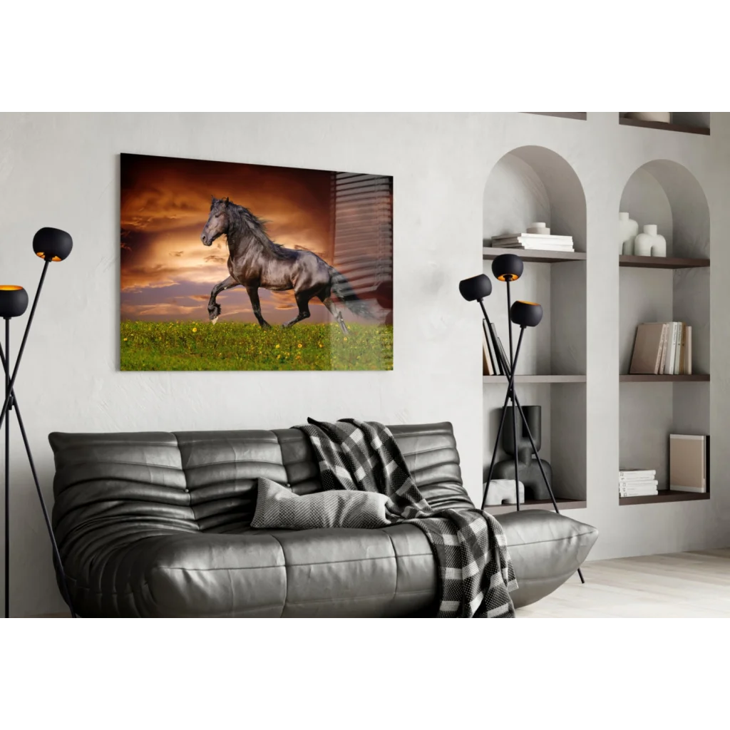 Galloping black horse on vibrant sunset field glass wall art