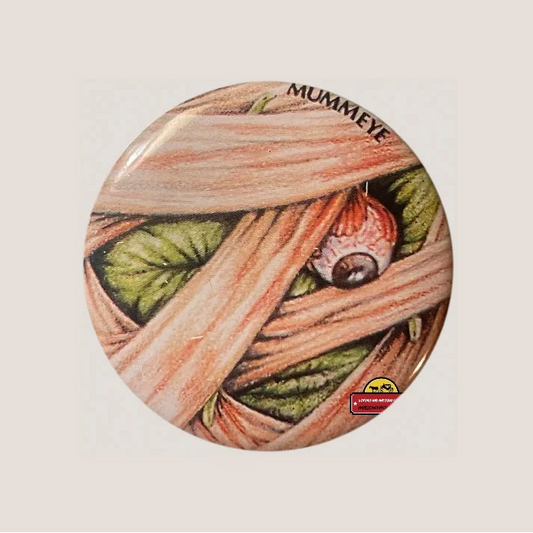 Vintage Mummeye Pin inspired by Garbage Pail Kids featuring mummified eyeball design