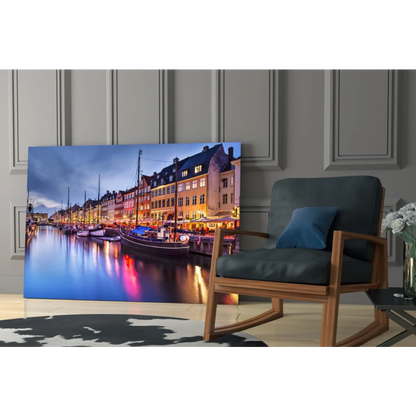 Vibrant twilight harbor canvas wall art with glowing buildings and boats