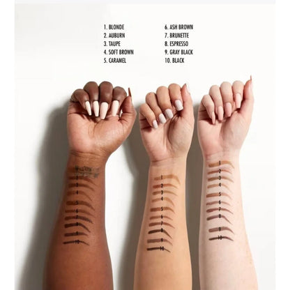 Three hands swatch Urban Decay brow pencils on diverse skin tones for NYX Snatch Brow Tint Pen Gray Black