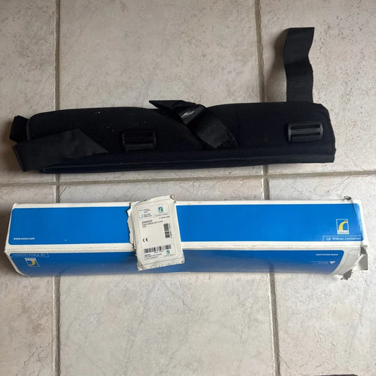 Black Össur knee immobilizer universal in blue white box with case
