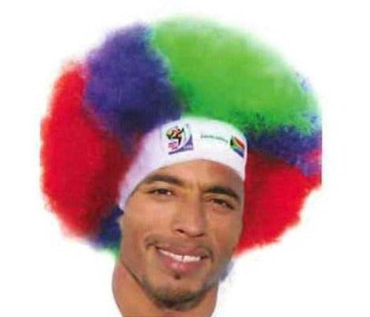 Man wearing colorful red, blue, and green afro wig with white headband featuring FIFA World Cup logo.