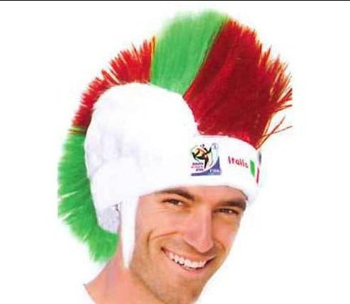 Man wearing Italy flag mohawk wig with red, white, and green spiky hair and white headband.