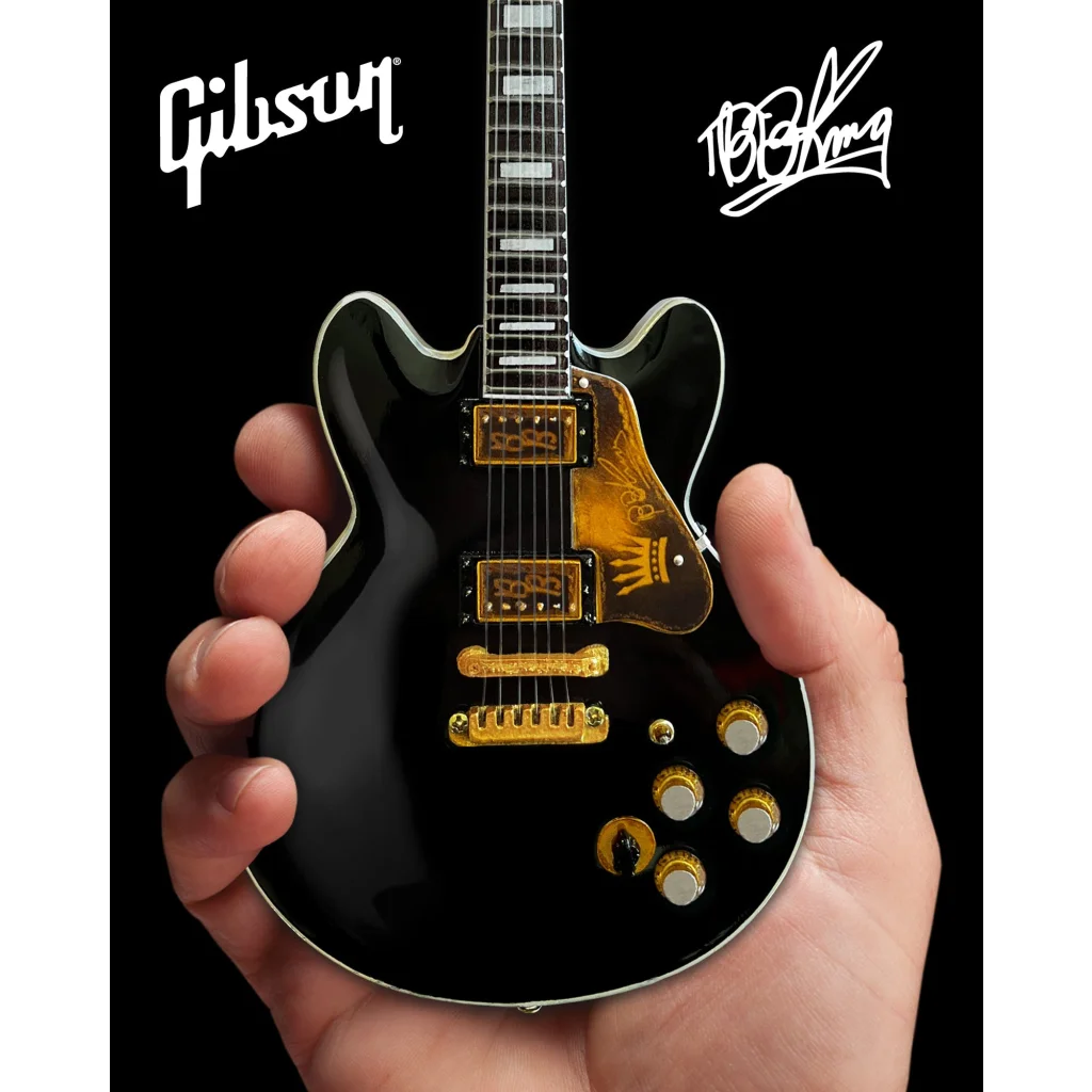 Black Gibson Les Paul guitar model with gold hardware by Axe Heaven®