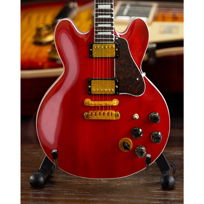 Red Gibson Les Paul guitar model with gold hardware by Axe Heaven®