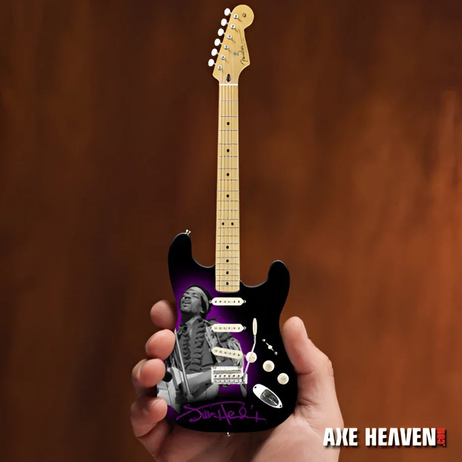 Miniature purple Jimi Hendrix Stratocaster guitar on Axe Heaven® stand