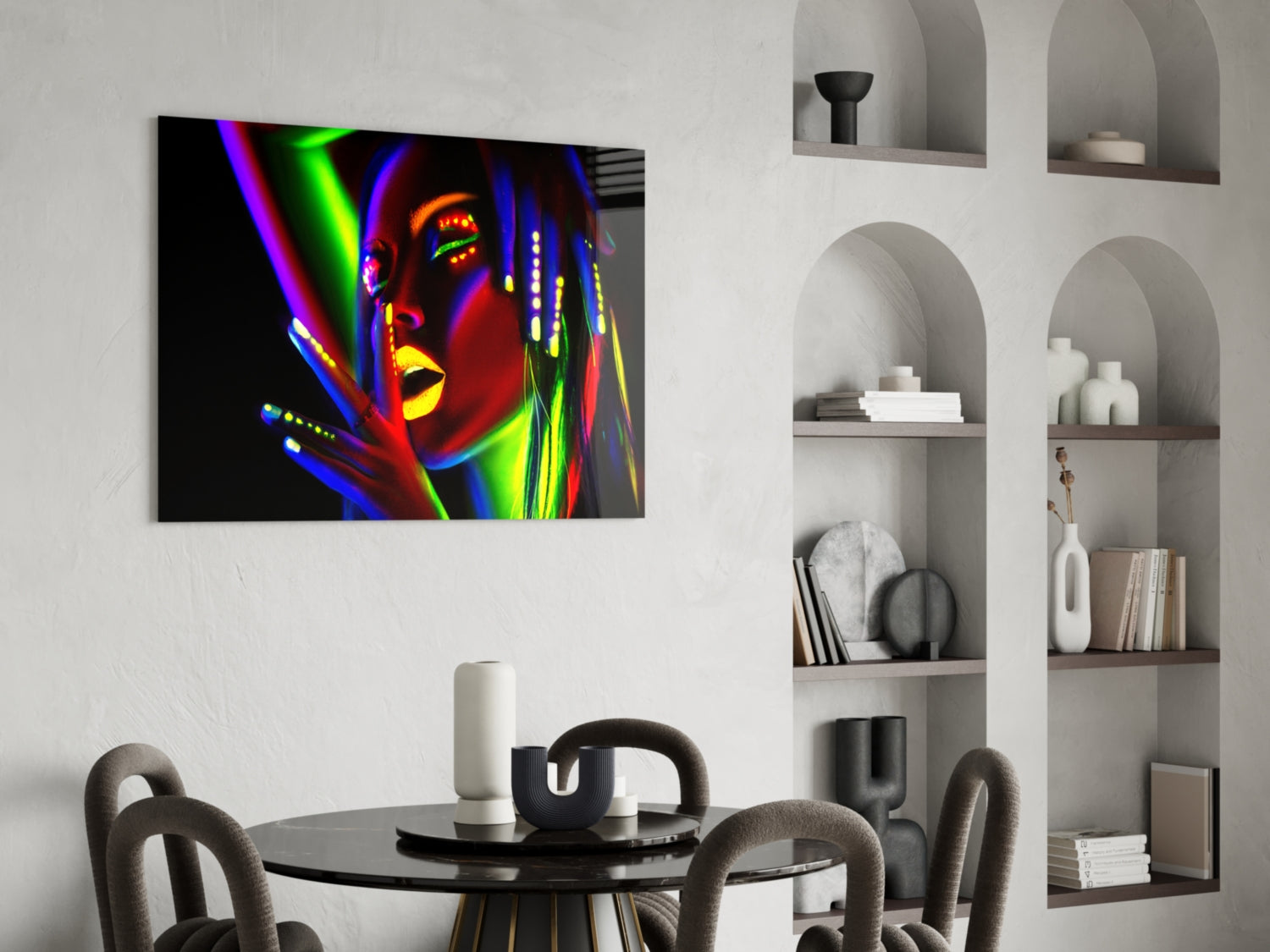 Vibrant neon portrait of a woman's face in rainbow colors displayed on glass above a dining table.