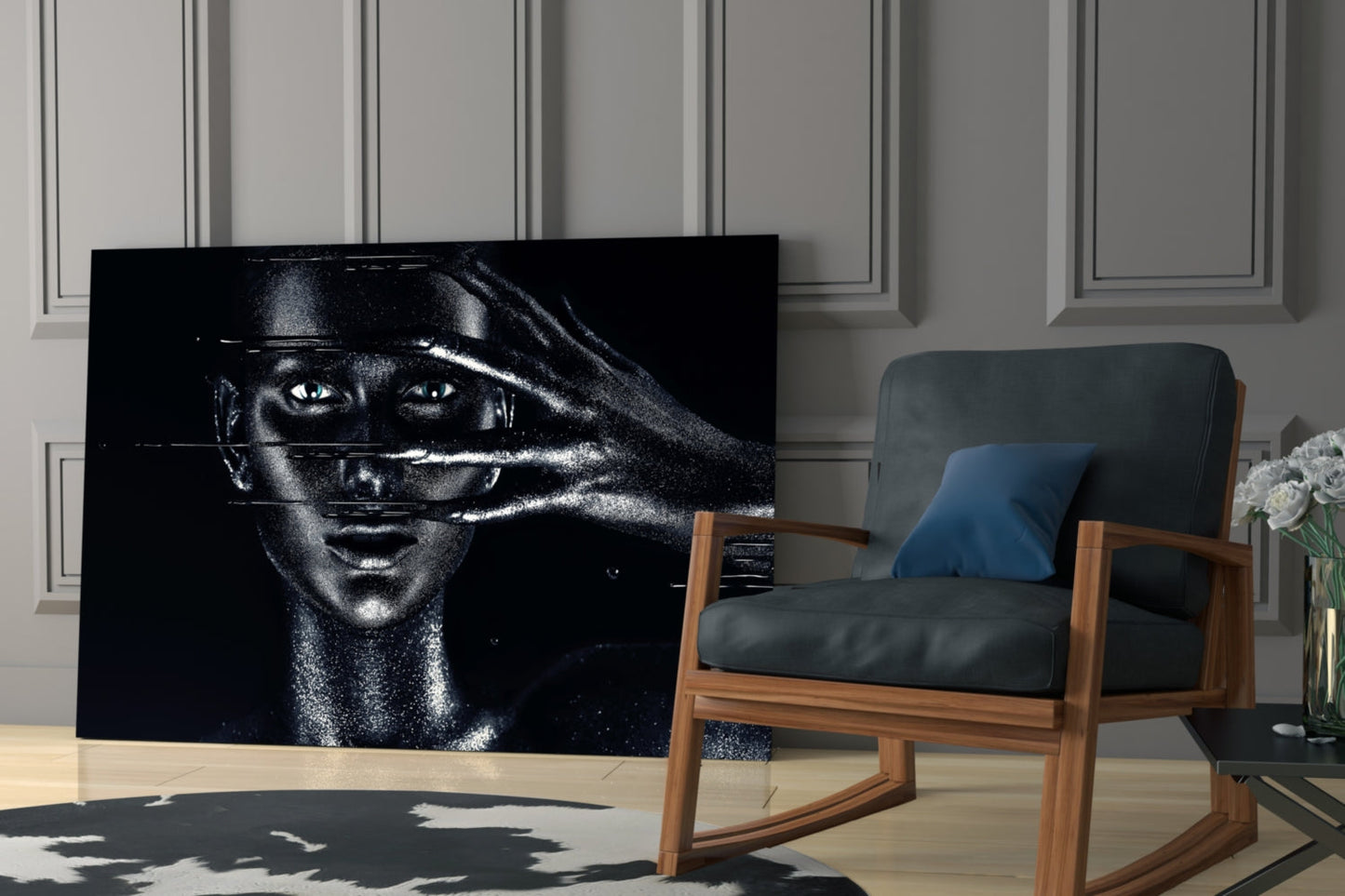 Black and white portrait glass art displayed in modern living room with wooden chair and potted flowers.