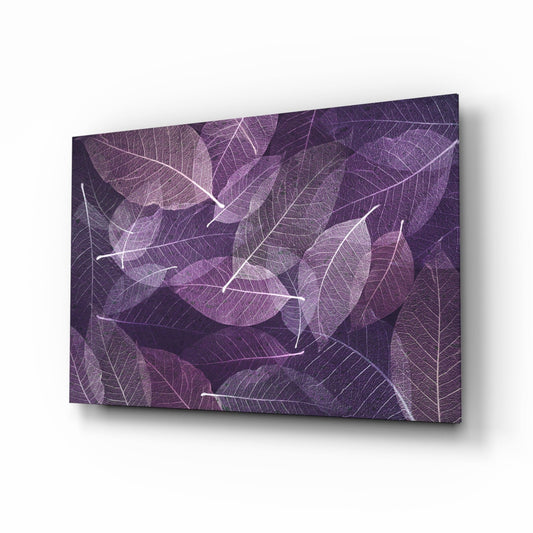 Purple skeleton leaf veins glass wall art displayed at an angled perspective showing translucent layered leaves against dark background.