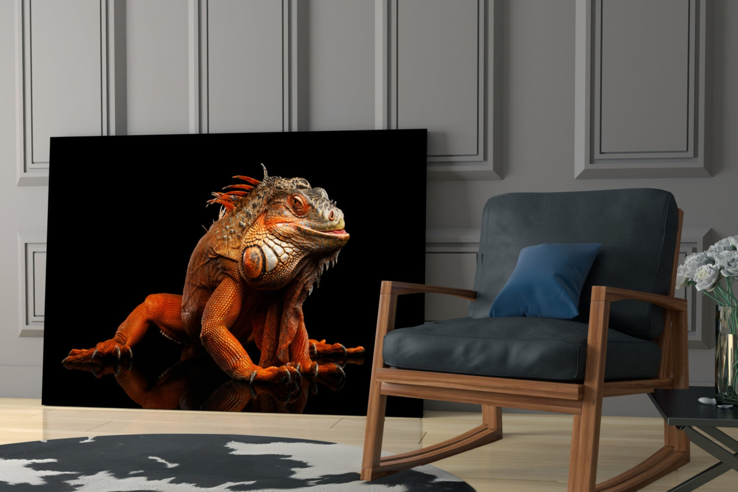 Orange and red iguana with detailed scales displayed on black glass panel in modern living room setting.