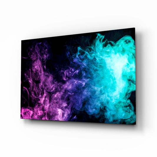 Angled perspective of glass wall art displaying swirling magenta, purple, and cyan smoke effects against black background.