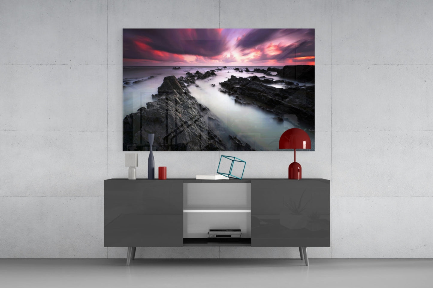 Crimson Sky Over Black Rocks Glass Wall Art