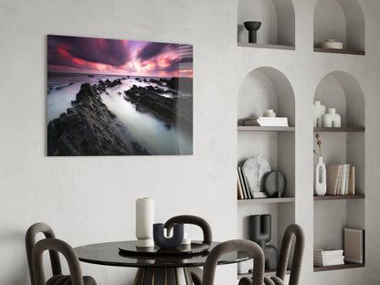 Crimson Sky Over Black Rocks Glass Wall Art