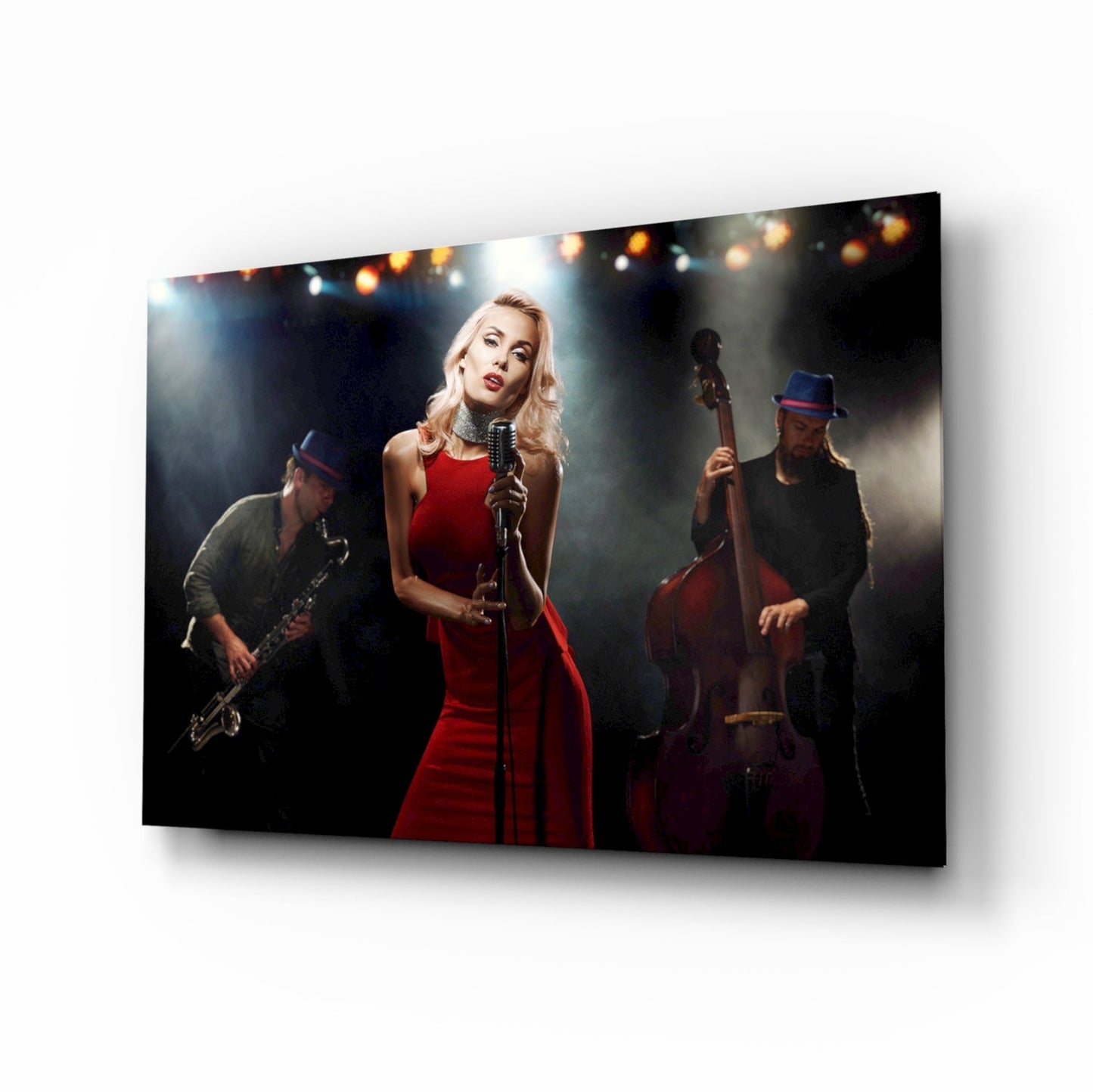 Glass wall art displaying a blonde female vocalist in a red dress singing at a microphone with a jazz band on stage.