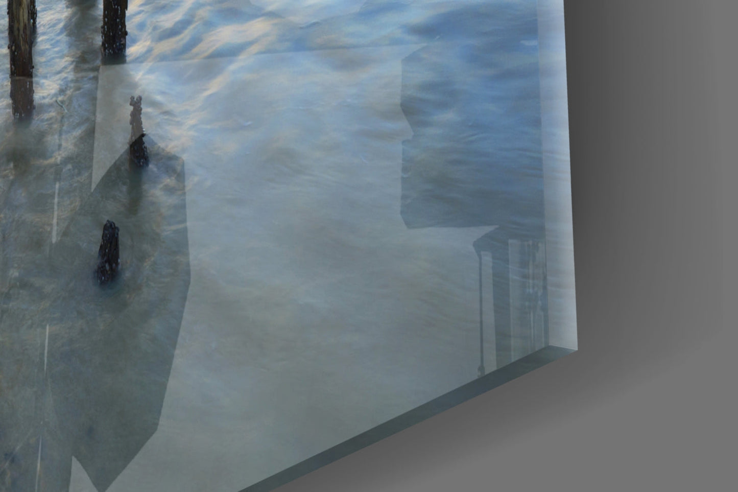 Weathered Pier Posts Calm Sea Landscape Glass Wall Art