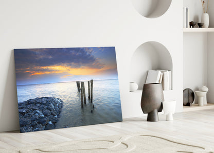 Weathered Pier Posts Calm Sea Landscape Glass Wall Art