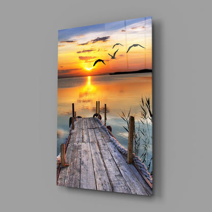 Golden Sun and Seagulls Over Dock Glass Wall Art