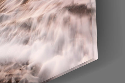 Close-up angled view of frosted glass panel showing white turbulent wave texture against gray background.