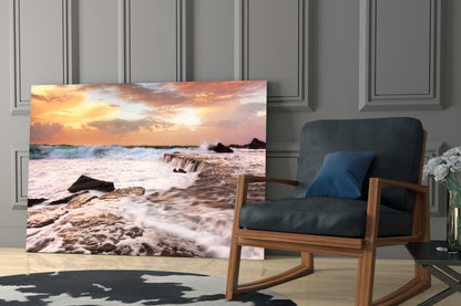 Vicious Waves Glass Wall Art displayed on floor leaning against wall beside wooden chair in modern interior setting.