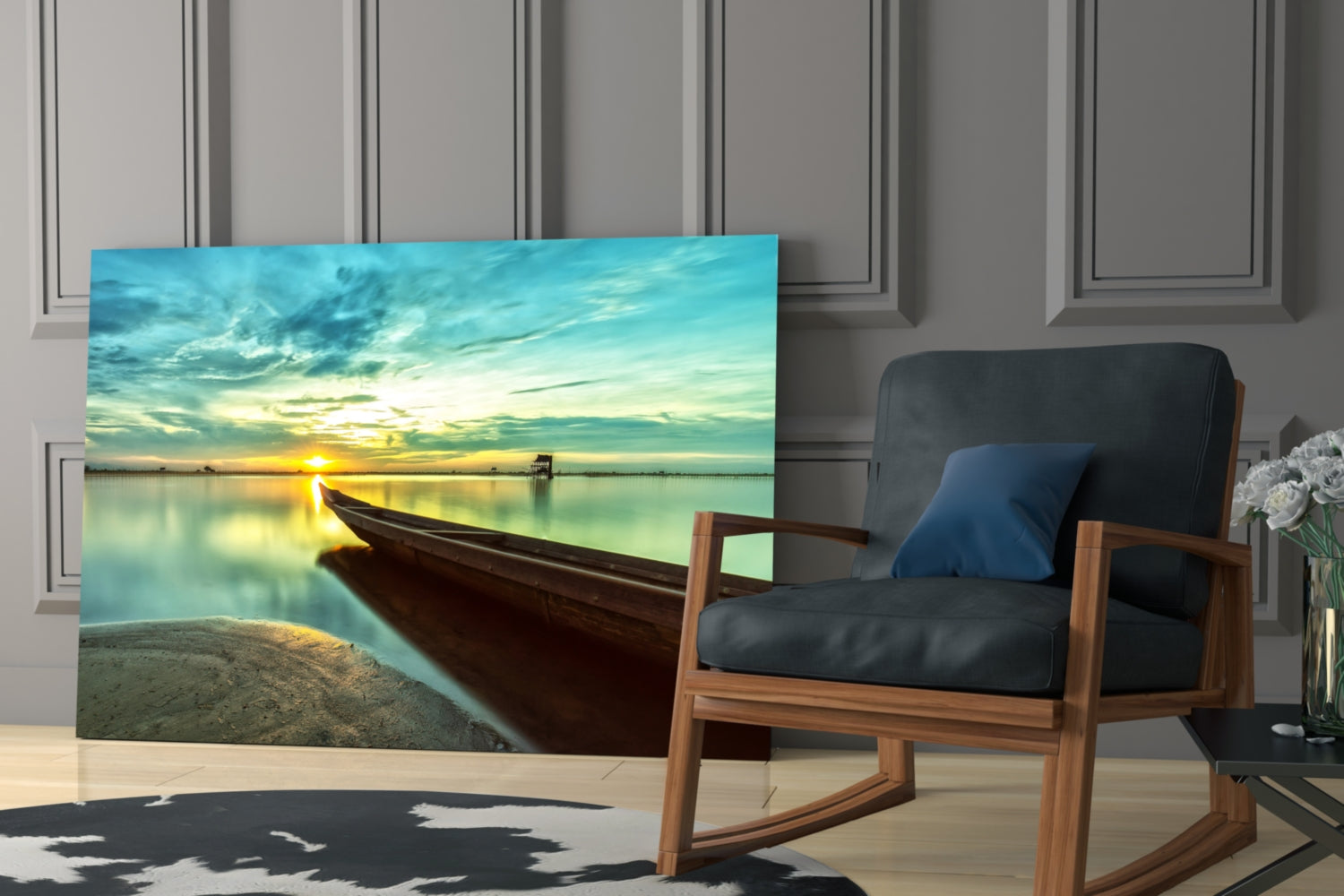Glass wall art depicting a wooden kayak on sandy beach at sunset, displayed in a modern living room next to a wooden chair.