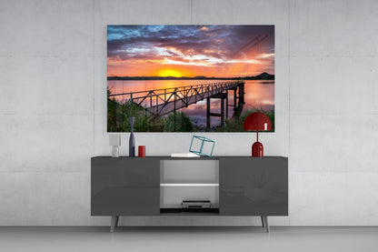 Fiery Sunset Lake Bridge Glass Wall Art