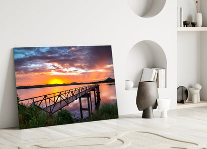 Fiery Sunset Lake Bridge Glass Wall Art