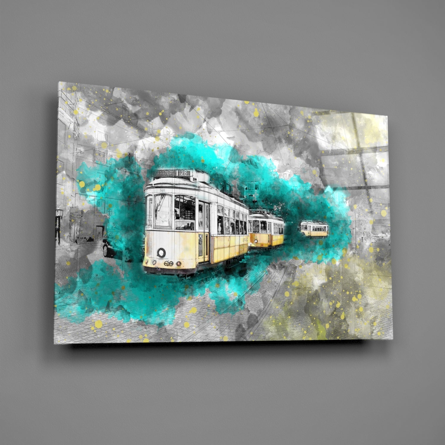 Glass wall art featuring illustrated vintage tram with yellow and white livery surrounded by turquoise watercolor splashes on gray cityscape background.
