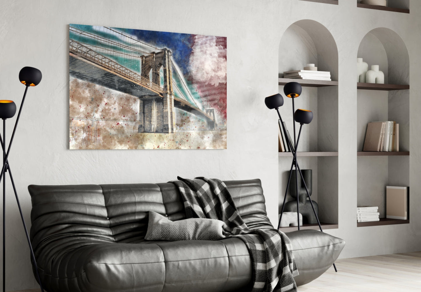 Bridge glass wall art featuring Brooklyn Bridge with teal and burgundy sky tones displayed above black leather sofa in modern living room.